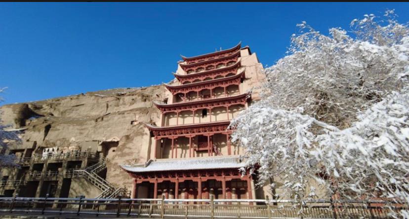 Photo taken on March 25, 2022 shows a view of the Mogao Grottoes, a world cultural heritage site, in Dunhuang, northwest China's Gansu Province