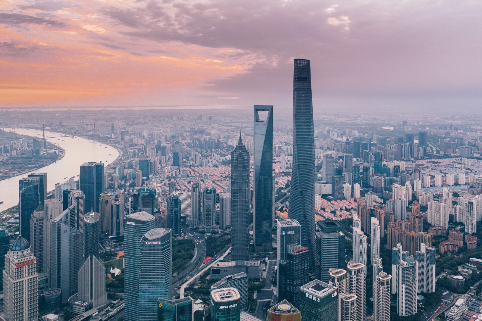 road-trip-with-raj-py8eyAh9J3A-unsplash A picture of the skyline Shanghai China