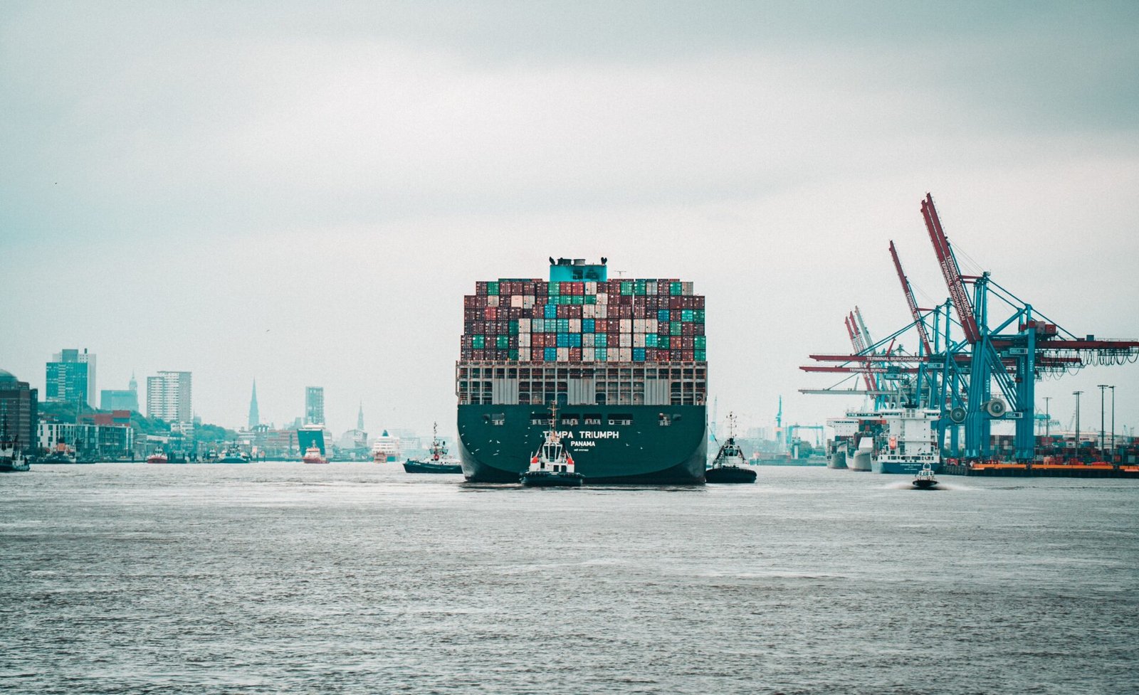 Container ship filled with Chinese goods arriving at the port in Hamburg, Germany.