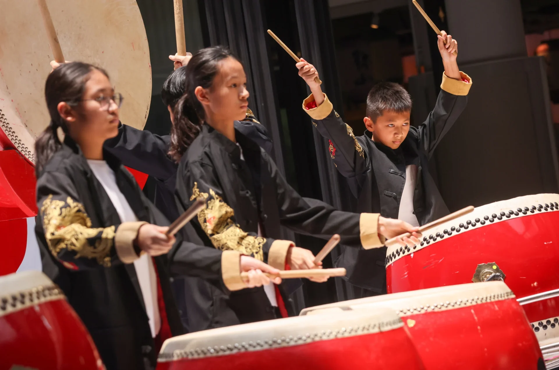 Hong Kong secondary school students perform during a press conference for the 20th Anniversary of the Hong Kong Drum Festival