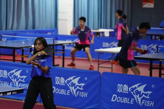 Young Maldivian table tennis players attend a training session with young players from the table tennis team of Yunnan in Kunming, southwest China's Yunnan Province.