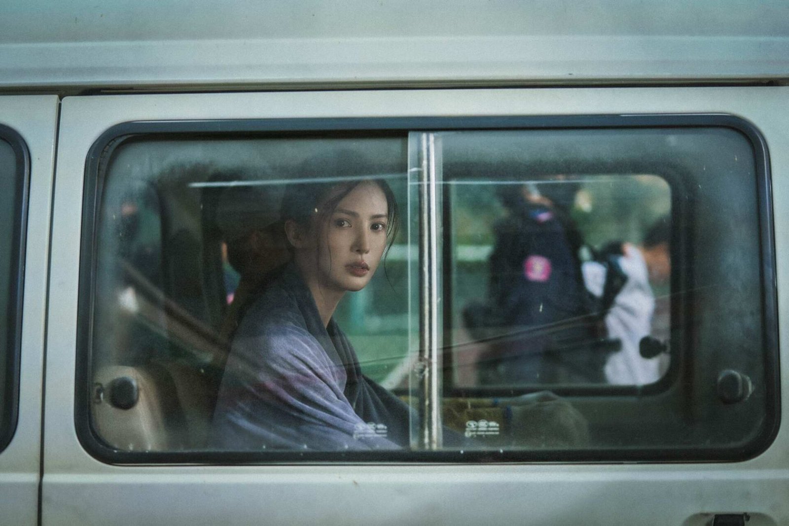 Gina Jin Chen as online croupier Anna in a still from “No More Bets”.