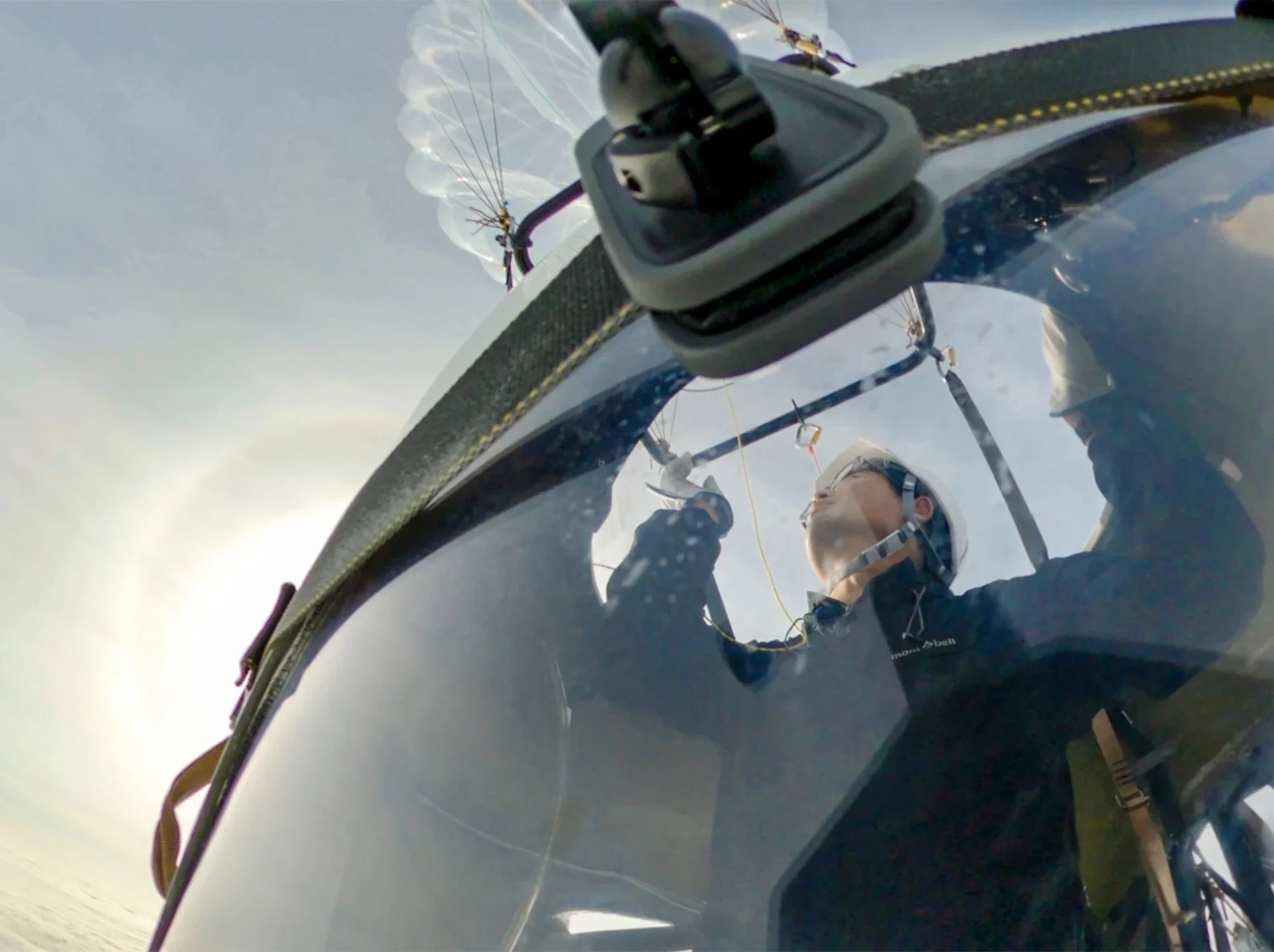 Akihito Oikawa is pictured aboard the cabin that hangs from a helium balloon on a test flight. Photo by Iwaya Inc.