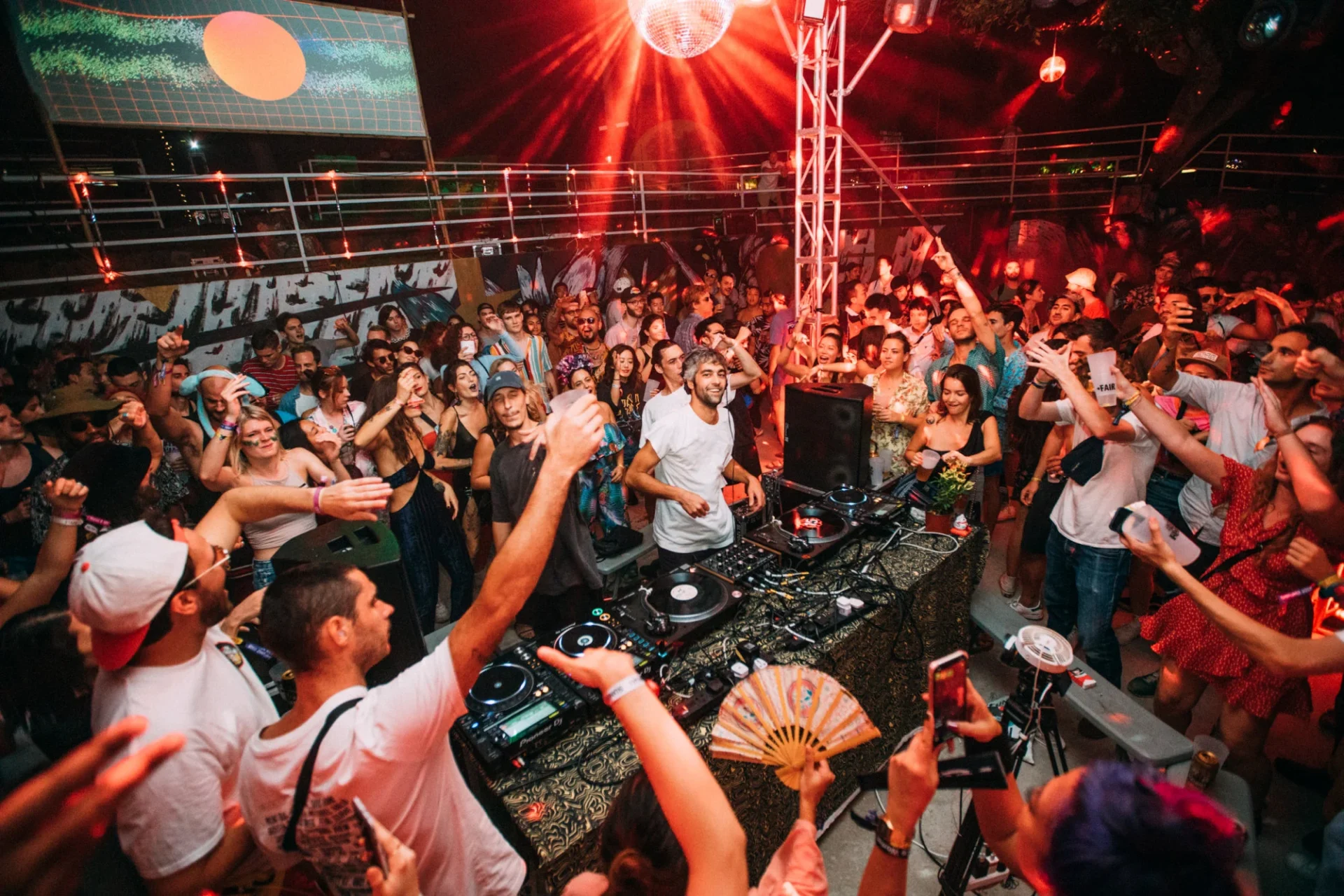 Festivalgoers gather around the DJ deck at a previous iteration of Shi Fu Miz. Photo: Shi Fu Miz