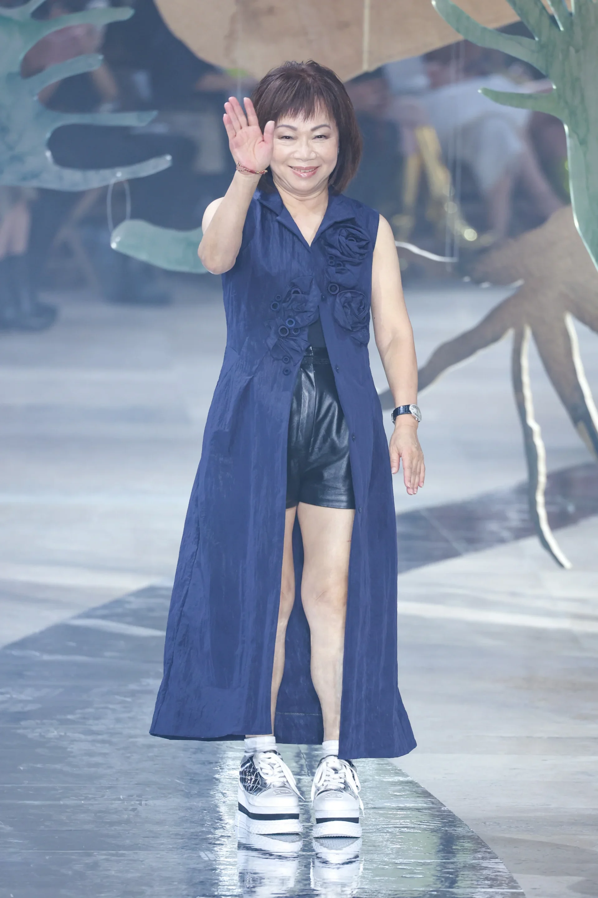Designer Wang Chen Tsai-Hsia walks the catwalk during the Shiatzy Chen womenswear spring/summer 2024 show at Paris Fashion Week on October 2 in Paris, France. Photo: Getty Images.