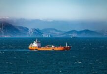 Oil Edges Higher as Hormuz Risks Return and Traders Watch Diplomacy ship, sea, water, sight, transport, nature, cargo ship, tanker, oil, mountains, gibraltar, coastline, strait
