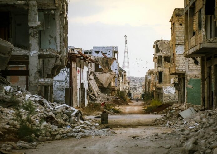 a destroyed building in Syria