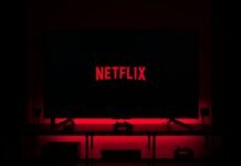 flat screen television displaying Netflix logo