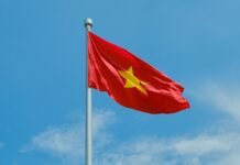 Vietnam’s President To Lam to Visit China Next Week for State Visit A chinese flag flying high in the sky