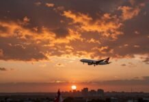 Airplane flying through fiery sky over Europe.