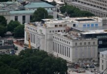 Fed Officials Signal Rate Hike if Inflation Fails to Cool, Minutes Show